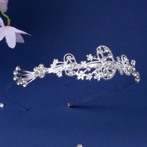 Elegant silver crown headband with crystal rhinestones and floral pattern for weddings