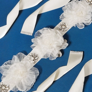 Elegant bridal belt with white chiffon flowers and sparkling rhinestones on satin ribbon