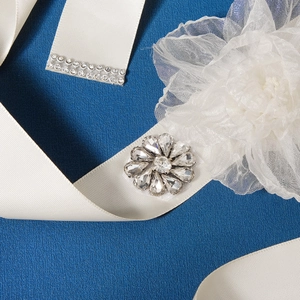 Elegant white bridal sash belt with organza flower and sunflower rhinestones on satin
