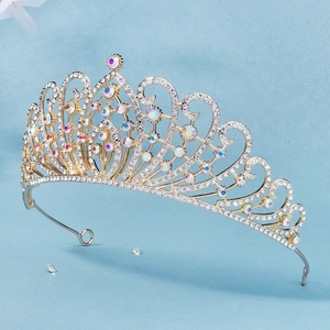 Detailed close-up of a silver bridal crown with colorful AB rhinestones and crystals