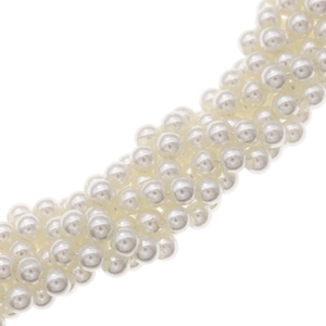 Close-up of white pearls with elegant luster and round texture on a clean white background