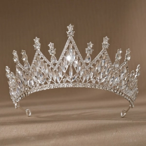 Close-up of luxurious bridal crown with sparkling crystal rhinestones in silver setting