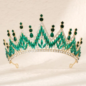 Luxury bridal crown with green crystals and gold base for weddings and pageants