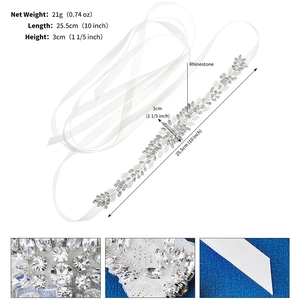 Detail showing bridal belt dimensions with crystal rhinestone branch pattern and white satin ribbon