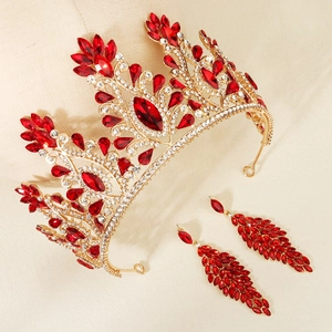 Detail of red crystal gold bridal tiara and earring set for wedding pageant