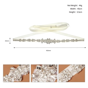 Macro detail of bridal belt featuring intricate marquise rhinestones and silver metal base