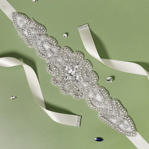 Luxurious bridal sash with sparkling crystals and white satin ribbon for wedding dresses