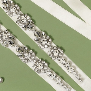 Elegant bridal belt with sparkling crystal rhinestones and white satin ribbon for weddings