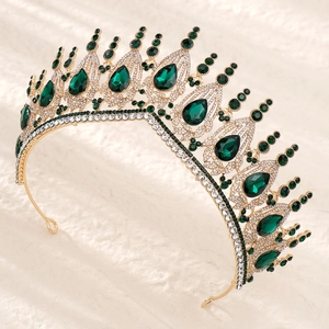 Luxury gold bridal crown with emerald water-drop gemstones and sparkling white crystals