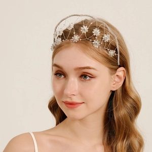 Elegant bridal floral headband with crystal flowers and silver mesh wire for weddings