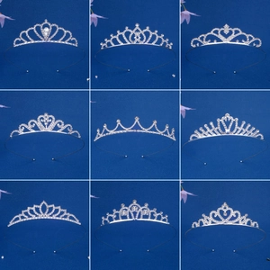 Set of nine silver rhinestone tiara headbands in heart and teardrop styles for girls