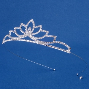 Detailed view of silver flower crown headband with sparkling rhinestones and metal frame