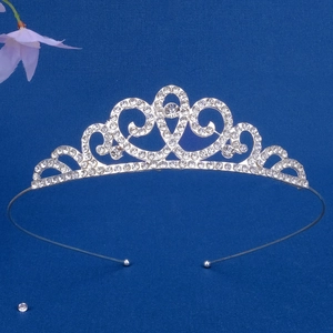 Front macro detail of a silver princess crown headband with shimmering crystal rhinestones