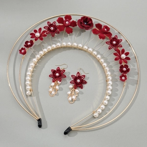 Detailed set of burgundy velvet flowers and white pearls on gold crown with matching earrings