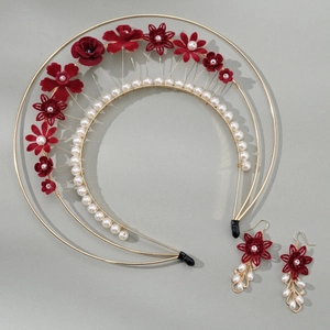 Detail of vintage Lolita gold halo headband with handmade red flowers and pearls