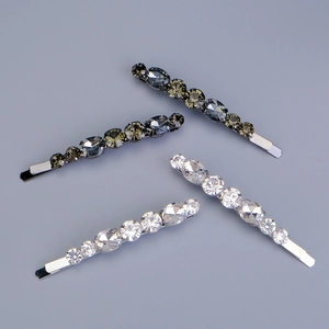 Ensemble de barrettes à cheveux étincelantes avec cristaux gris et blancs sur métal