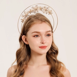 Elegant gold flower halo headband with pearls for weddings and bohemian fashion