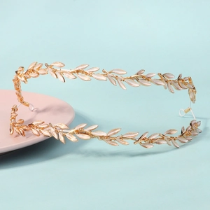 Golden leaf crown headband with white enamel detailing for bridal hair styling
