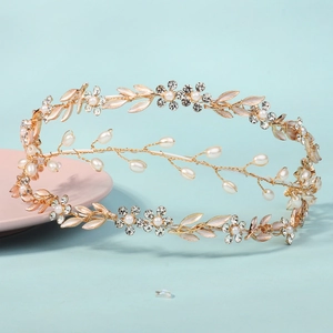 Handmade gold floral headband with vintage leaf pattern and pearls for bridal wedding hair