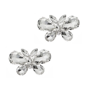 Close-up of butterfly crystal shoe clips with sparkling rhinestones for bridal heels