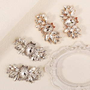Sparkling crystal flower shoe clips in gold and silver for wedding and party footwear