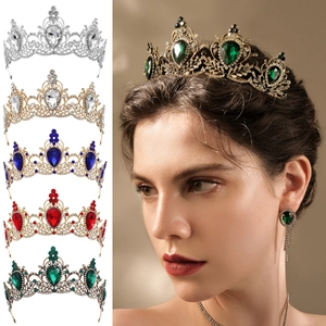 Detailed view of vintage baroque bridal crowns with colorful teardrop crystal settings