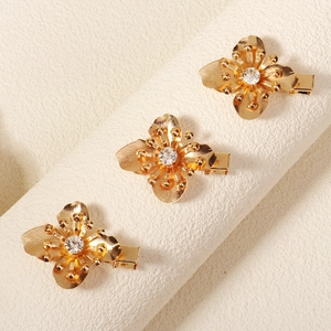 Dreiteiliges Set goldener Blumen-Haarspangen aus Legierung mit funkelndem Strassstein