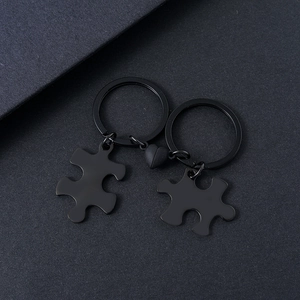 Matte black stainless steel puzzle couple keychain with heart magnet connection