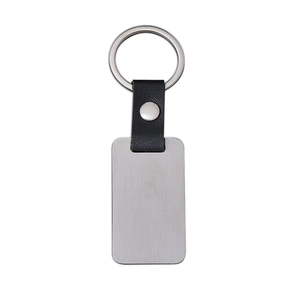 Minimalist rectangular metal keychain with black leather strap and brushed silver finish