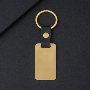 Minimalist rectangular gold metal tag and black leather keychain for laser engraving