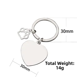 Polished heart shaped metal keychain with hollow paw pendant and 30mm ring