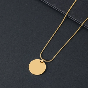 Minimalistische goldene Schlangenkette aus Edelstahl mit glattem Rundanhänger für Damen