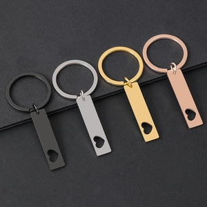 Stainless steel heart cutout keychains in black, silver, gold, and rose gold finishes