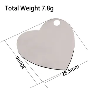 Polished stainless steel heart-shaped pendant keychain with 30mm x 28.5mm dimensions