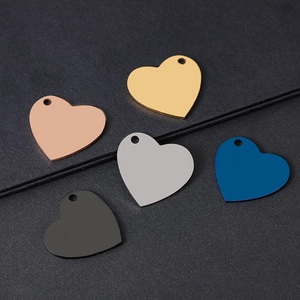 Five heart-shaped stainless steel charms in gold, silver, rose gold, blue, and matte black