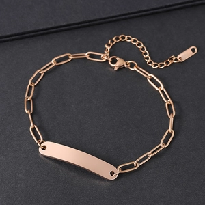 Rose gold paperclip chain bracelet with a smooth blank engraving plate and lobster clasp