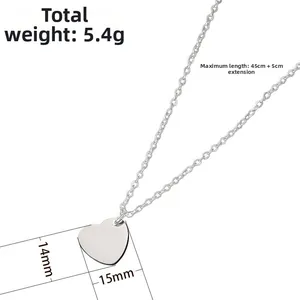 Macro detail of silver heart necklace with dimensions 15mm by 14mm and 5.4g weight