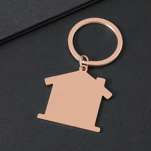 Polished house shaped stainless steel keychain in rose gold for custom engraving