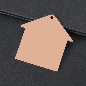 Minimalist house-shaped rose gold stainless steel pendant with polished mirror finish