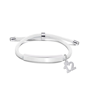 Detail of white braided cord bracelet with polished silver bar and number 12 charm