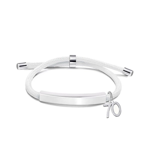 Detailed close-up of woven white cord bracelet with a polished silver plate and number 70 charm