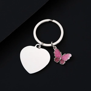 Stainless steel keychain with heart pendant and pink glittery butterfly charm