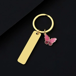 Golden stainless steel keychain with rectangle blank tag and pink glitter butterfly charm
