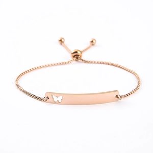 Detail of rose gold butterfly cutout bar bracelet with adjustable box chain slide