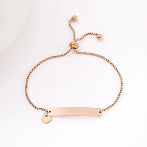 Rose gold stainless steel bar bracelet with heart charm and adjustable box chain link