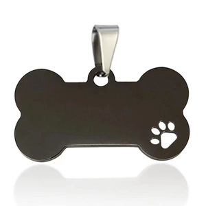 Matte black stainless steel bone-shaped pet ID tag with hollow dog paw cutout