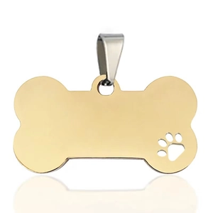 Gold hollow dog bone pet tag made of polished stainless steel with paw print cut-out