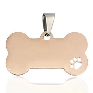 Rose gold bone-shaped stainless steel pet ID tag with hollow dog paw print and metal clasp