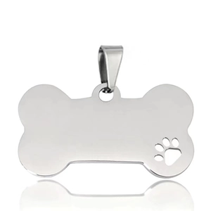 Bone-shaped stainless steel pet ID tag with hollow paw print and polished silver finish