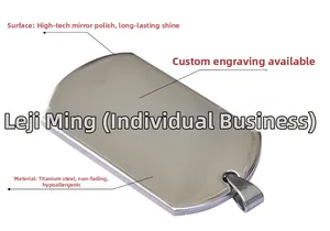 Detailed close-up of polished stainless steel dog tag pendant with laser engraving surface